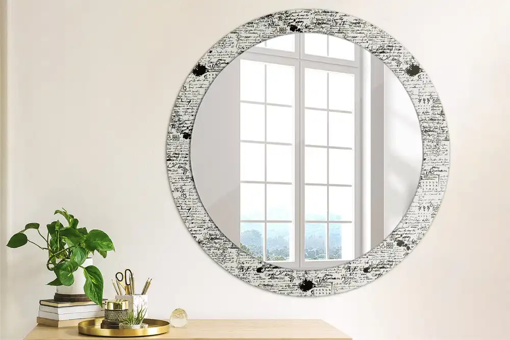 Oglindă rotundă decorativă cu design tip mâzgăleli