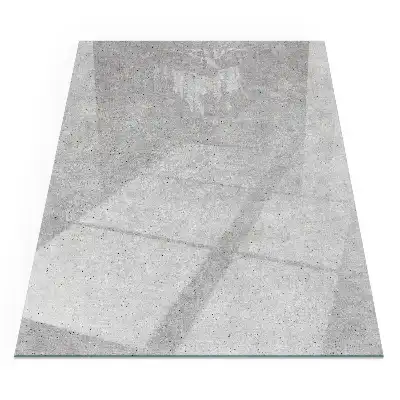 Placă dreptunghiulară din sticlă securizată pentru protecție sub sobă, cu textură de beton brut