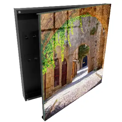 Suport pentru chei de perete cu design de arhitectură istorică și elemente verzi