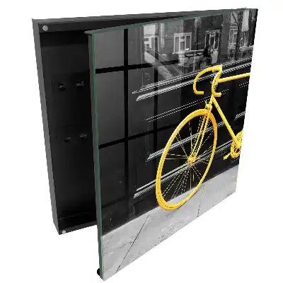 Casetă pentru chei de bicicletă cu design galben pe fundal alb-negru