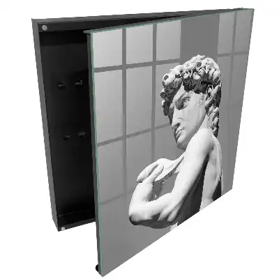 Casetă de chei cu sculptură elegantă pe fundal gri
