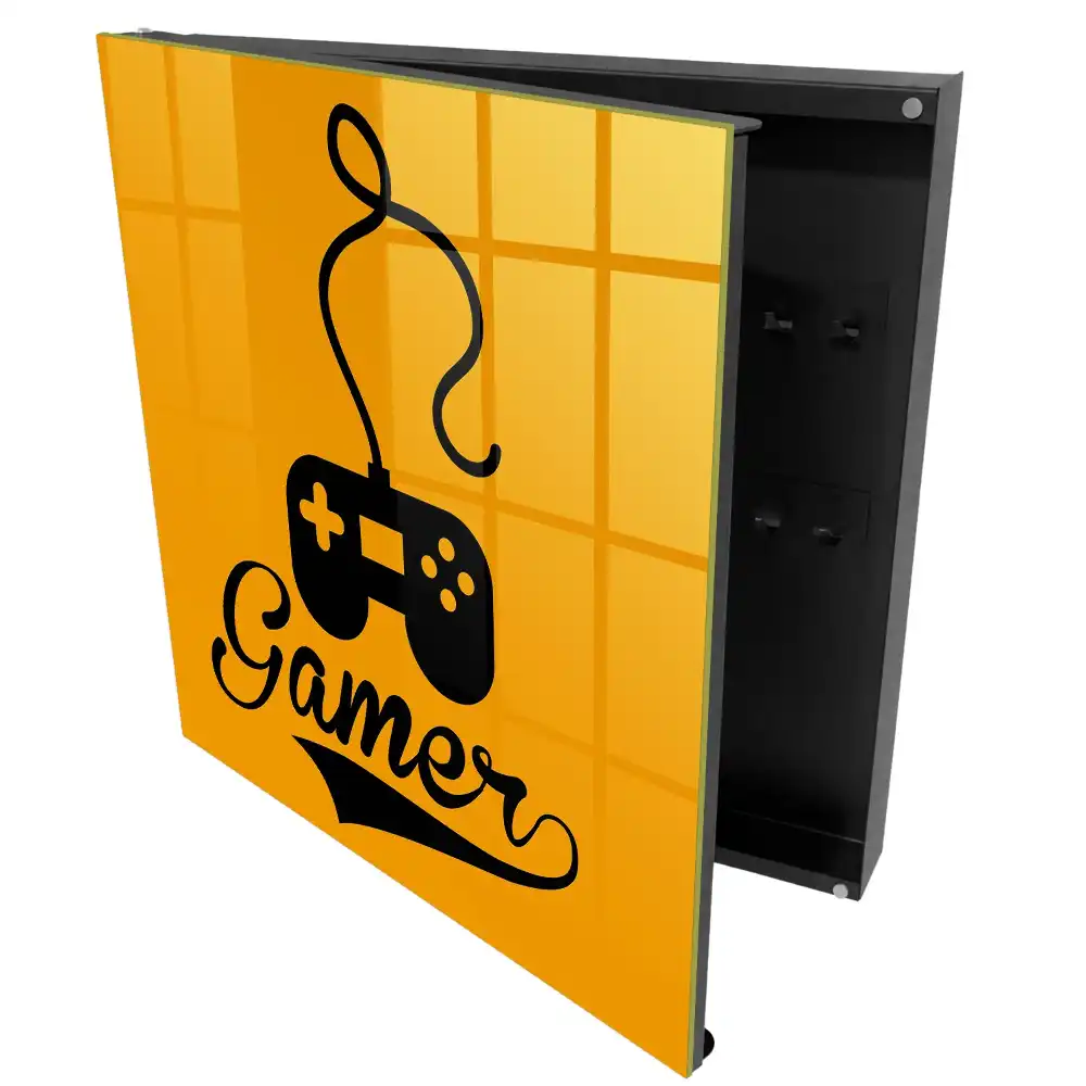 Suport de perete pentru chei cu design de controller negru pe fundal portocaliu