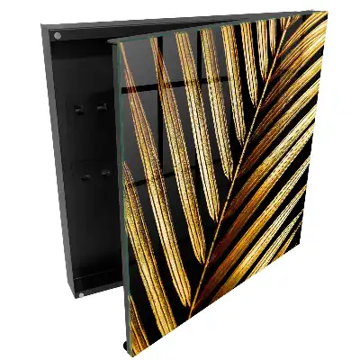 Suport de perete pentru chei cu design de frunze aurii pe fundal negru