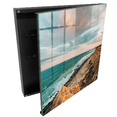 Suport de chei pentru perete cu peisaj stâncă peste ocean la apus